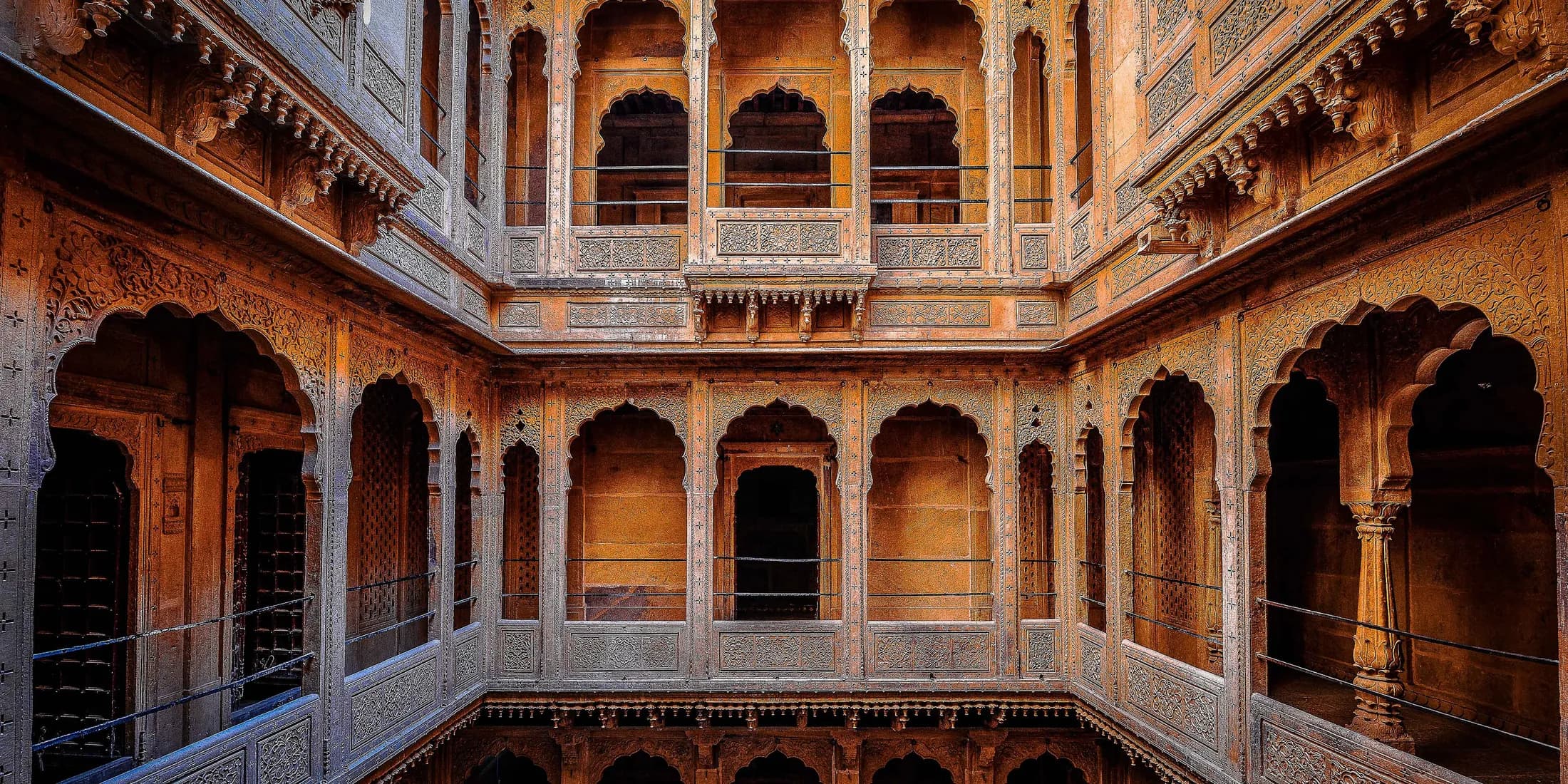 The carved sandstone courtyard of Patwon Ki Haveli in Jaisalmer